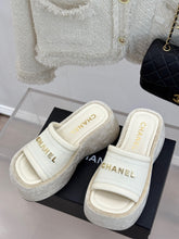 PLATFORM SLIPPERS IN WHITE LAMBSKIN